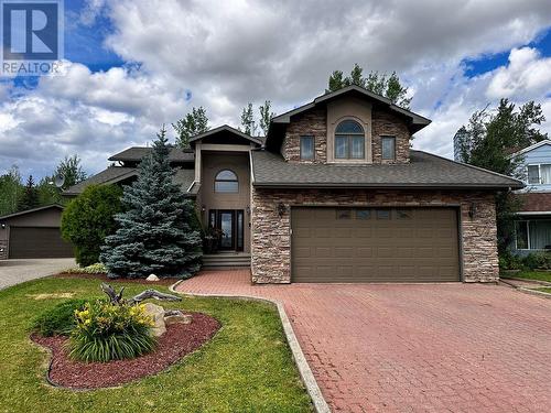 10701 Pinecrest Lane, Dawson Creek, BC - Outdoor With Facade