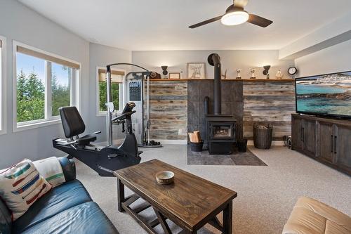 11965 Highway 3A, Boswell, BC - Indoor Photo Showing Gym Room With Fireplace