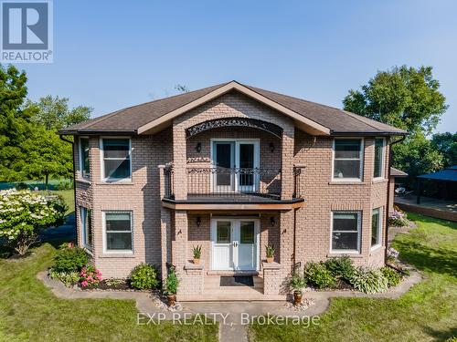 117 Front Street, Alnwick/Haldimand, ON - Outdoor With Balcony With Facade