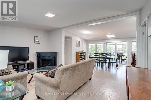 51 Riverside Drive, Kawartha Lakes (Bobcaygeon), ON - Indoor Photo Showing Living Room With Fireplace