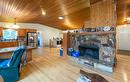 1053 Ptarmigan Road, Chase, BC  - Indoor Photo Showing Living Room With Fireplace 