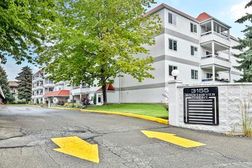 312-3155 Demontreuil Court, Kelowna, BC - Outdoor With Balcony With Facade