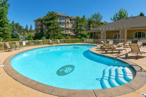 108-1962 Enterprise Way, Kelowna, BC - Outdoor With In Ground Pool With Deck Patio Veranda With Backyard