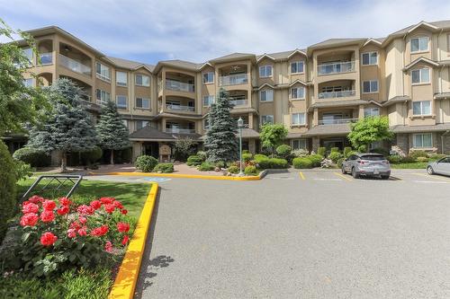 108-1962 Enterprise Way, Kelowna, BC - Outdoor With Facade