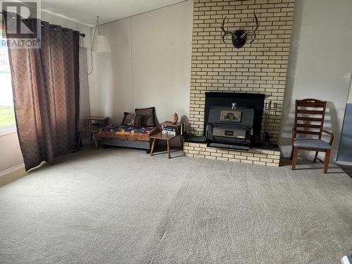 52 Finlay Forks Crescent, Mackenzie, BC - Indoor Photo Showing Living Room With Fireplace