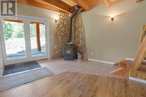 13575 Mountain Shores Road, Boswell, BC - Indoor Photo Showing Other Room With Fireplace