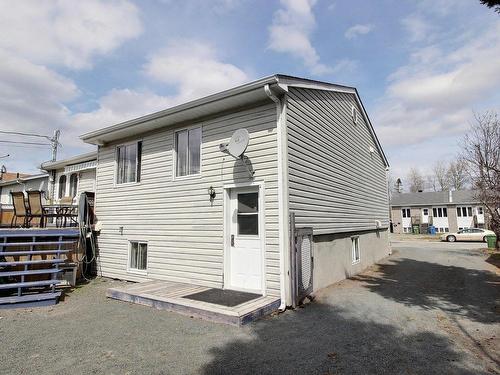 Back facade - 499  - 501 8E Avenue, Val-D'Or, QC - Outdoor With Exterior