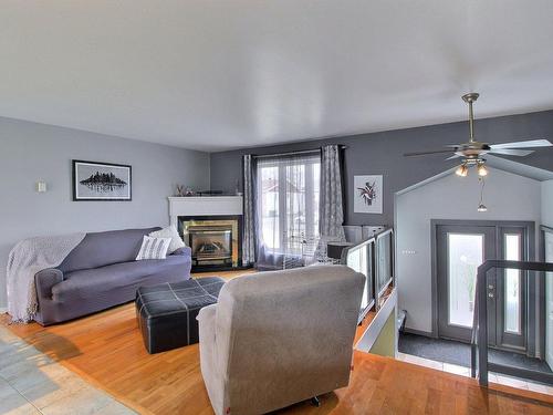 Living room - 499  - 501 8E Avenue, Val-D'Or, QC - Indoor Photo Showing Living Room With Fireplace