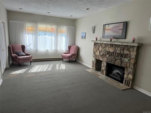 408-5110 Cordova Bay Rd, Saanich, BC - Indoor Photo Showing Living Room With Fireplace