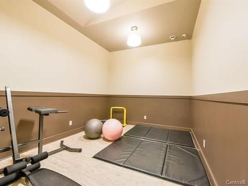 Exercise room - 203-5151 Av. Eliot, Laval (Chomedey), QC - Indoor Photo Showing Other Room