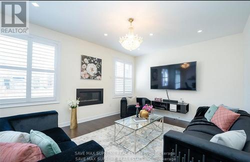 24 Argelia Crescent, Brampton (Credit Valley), ON - Indoor Photo Showing Living Room With Fireplace