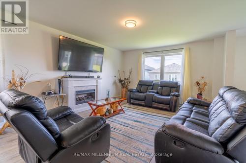 2 Millcreek Drive, Loyalist, ON - Indoor Photo Showing Living Room With Fireplace