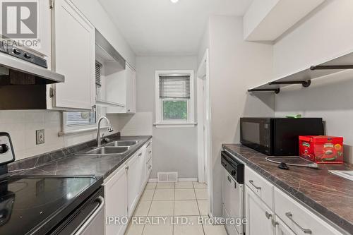 2504 Askin Avenue, Windsor, ON - Indoor Photo Showing Kitchen With Double Sink