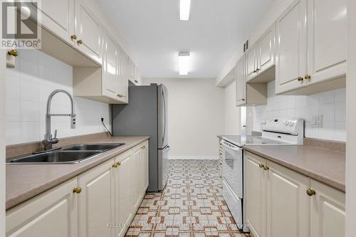 2012 - 61 Richview Road, Toronto (Humber Heights), ON - Indoor Photo Showing Kitchen With Double Sink