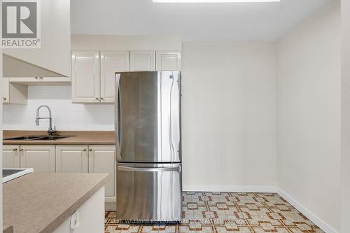 2012 - 61 Richview Road, Toronto (Humber Heights), ON - Indoor Photo Showing Kitchen With Double Sink