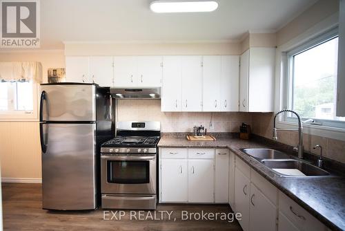 31 Spruce Drive, Temagami, ON - Indoor Photo Showing Kitchen With Double Sink