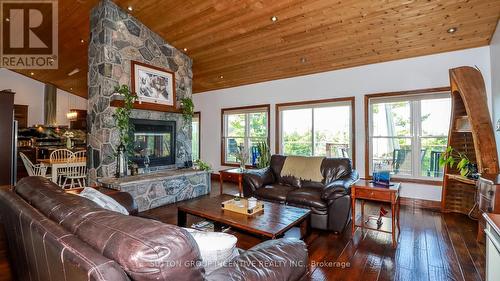 65 Big Sound Road, Mcdougall, ON - Indoor Photo Showing Living Room With Fireplace