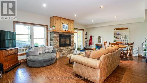 65 Big Sound Road, Mcdougall, ON - Indoor Photo Showing Living Room With Fireplace