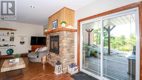 65 Big Sound Road, Mcdougall, ON - Indoor With Fireplace