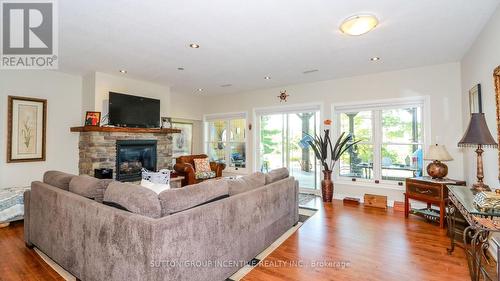 65 Big Sound Road, Mcdougall, ON - Indoor Photo Showing Living Room With Fireplace