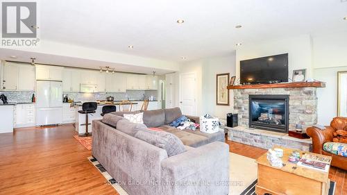 65 Big Sound Road, Mcdougall, ON - Indoor Photo Showing Living Room With Fireplace