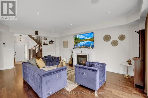 17 Lagoon Avenue, Hamilton (Hamilton Beach), ON - Indoor Photo Showing Living Room With Fireplace