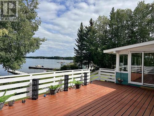 4040 Gill Place, Cluculz Lake, BC - Outdoor With Body Of Water With Deck Patio Veranda With View