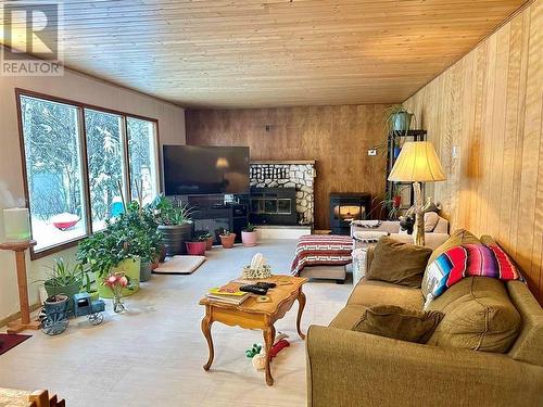 4040 Gill Place, Cluculz Lake, BC - Indoor Photo Showing Living Room With Fireplace