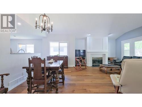 950 Lanfranco Road Unit# 45, Kelowna, BC - Indoor Photo Showing Dining Room With Fireplace