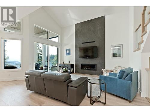 129 Summer Wood Drive, Kelowna, BC - Indoor Photo Showing Living Room With Fireplace