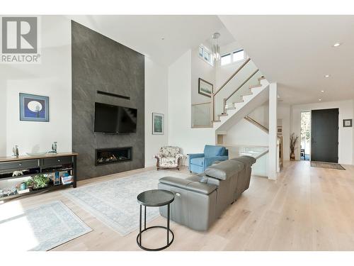 129 Summer Wood Drive, Kelowna, BC - Indoor Photo Showing Living Room With Fireplace