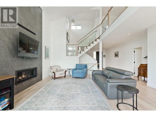 129 Summer Wood Drive, Kelowna, BC - Indoor Photo Showing Living Room With Fireplace