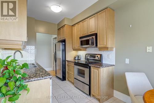 2305 - 78 Harrison Garden Boulevard, Toronto (Willowdale East), ON - Indoor Photo Showing Kitchen With Stainless Steel Kitchen With Double Sink