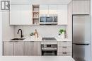 1305 - 36 Zorra Street, Toronto (Islington-City Centre West), ON  - Indoor Photo Showing Kitchen With Upgraded Kitchen 