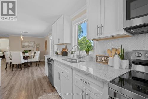 8 Kawartha Road, Clarington (Newcastle), ON - Indoor Photo Showing Kitchen With Double Sink