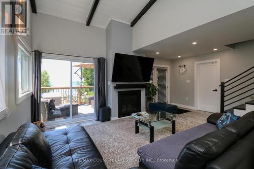 104 The Steps Road, Ramara (Brechin), ON - Indoor Photo Showing Living Room With Fireplace