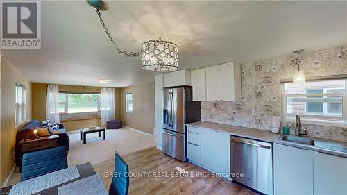 87 Sussex Square, Georgian Bluffs, ON - Indoor Photo Showing Kitchen