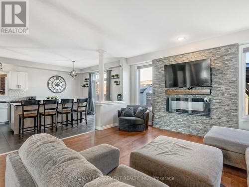 28 Garinger Crescent, Hamilton (Binbrook), ON - Indoor Photo Showing Living Room With Fireplace