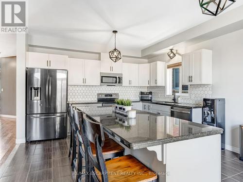 28 Garinger Crescent, Hamilton (Binbrook), ON - Indoor Photo Showing Kitchen With Upgraded Kitchen