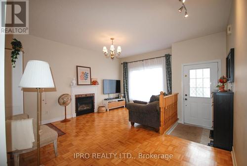 7128 Lowville Heights, Mississauga, ON - Indoor With Fireplace