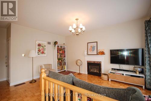 7128 Lowville Heights, Mississauga, ON - Indoor With Fireplace