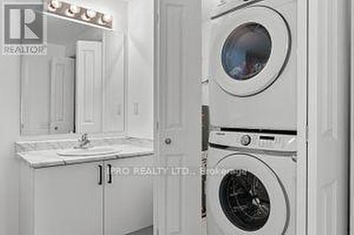 101 - 20 Koda Street, Barrie, ON - Indoor Photo Showing Laundry Room