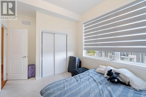 312 - 10 Halliford Place, Brampton (Goreway Drive Corridor), ON - Indoor Photo Showing Bedroom