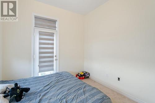 312 - 10 Halliford Place, Brampton (Goreway Drive Corridor), ON - Indoor Photo Showing Bedroom