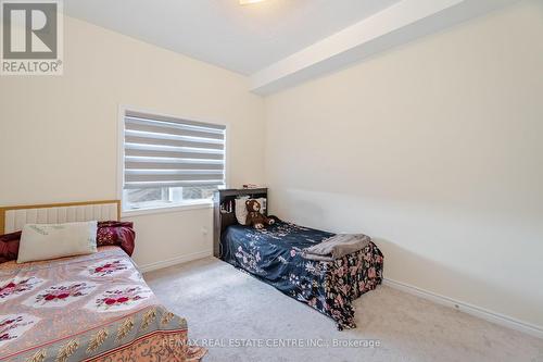 312 - 10 Halliford Place, Brampton (Goreway Drive Corridor), ON - Indoor Photo Showing Bedroom