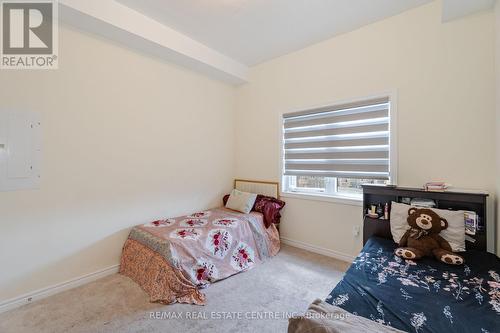 312 - 10 Halliford Place, Brampton (Goreway Drive Corridor), ON - Indoor Photo Showing Bedroom