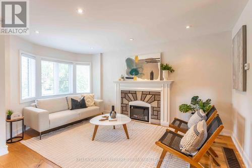 64 Superior Avenue, Toronto (Mimico), ON - Indoor Photo Showing Living Room With Fireplace