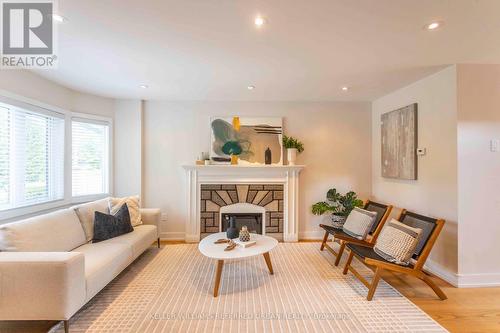 64 Superior Avenue, Toronto (Mimico), ON - Indoor Photo Showing Living Room With Fireplace