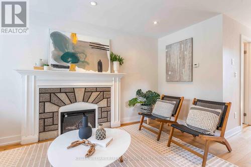 64 Superior Avenue, Toronto (Mimico), ON - Indoor Photo Showing Living Room With Fireplace