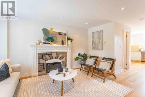 64 Superior Avenue, Toronto (Mimico), ON - Indoor Photo Showing Living Room With Fireplace